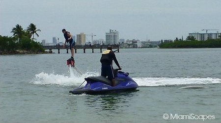 Flyboard hose connects to jetski that provides the propulsion