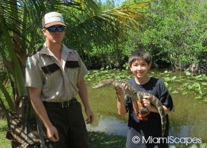 Kid with alligator